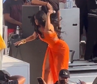 Cardi B throwing a mic at someone in the crowd /Photo credit: Wikimedia Commons