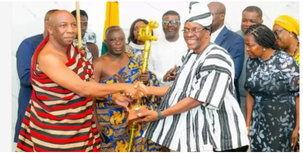 Speaker (second right) receiving the Suma Adinkra Sword