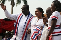 An old campaign photo showing Alan and Akufo-Addo with their respective spouses