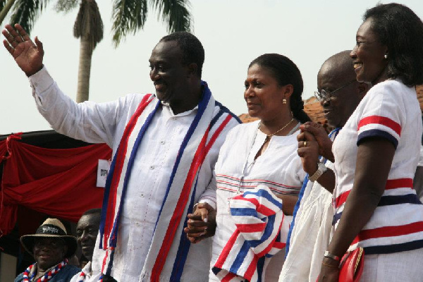 An old campaign photo showing Alan and Akufo-Addo with their respective spouses