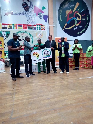 Osei Assibey with some executives of Africa Armwrestling Federation
