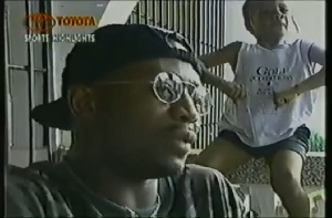 A young Dede Ayew flexing his muscles on the wall