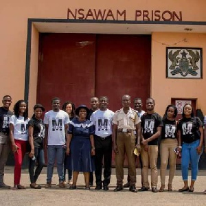 Some RAIN members in a photography with officers at the Nsawam prison