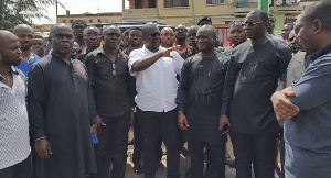 Deputy Chief of Staff, Francis Asenso with his team at the premises of Royal Gas Filling station