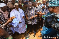 Dr Bawumia (holding the shovel) with the Yaa Naa, Abukari Mahama II (in while smoke)