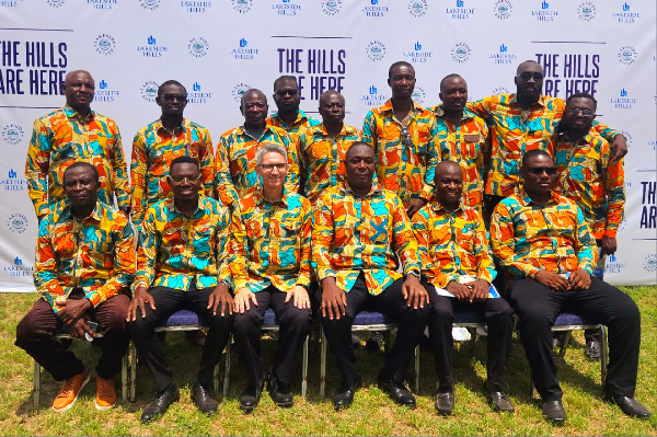 MD is 3rd from fright & Board Chair is 3rd from left