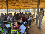 A picture of the caregivers receiving training