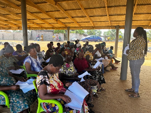 A picture of the caregivers receiving training