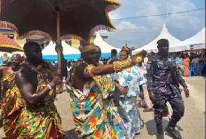 Iyalla Mac Davis clad in traditional attire