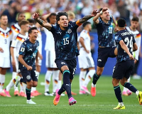Paraguay players celebrate after winning the penalty shootout