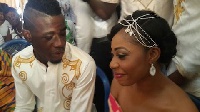 Afriyie Acquah and his wife Amanda Owusu