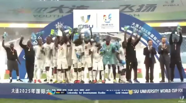 Players of UDS celebrating with the trophy