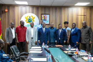 Lands minister pictured with committee members of VALCO and GIADEC