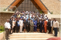 Participants, speakers and organizers in a group picture