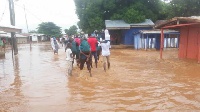The flood also destruction properties and brought activities in affected towns to a standstill