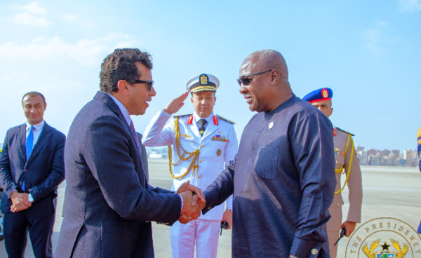 President John Dramani Mahama (R) during his arrival in Egypt