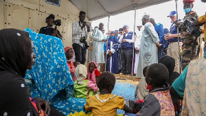 The WHO's Tedros Ghebreyesus (centre in background) also visited a camp for Sudanese refugees