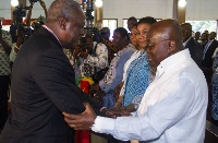 Nana Addo shakes hands with President Mahama