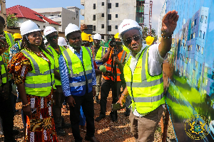 Akandoh and other personnel inspecting the La General Hospital project