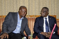 President Mahama (left) and the late John Evans Atta Mills