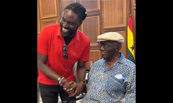 Roman Fada and Former President John Agyekum Kufuor exchanging handshake