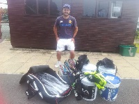 Luis Marque with the items donated