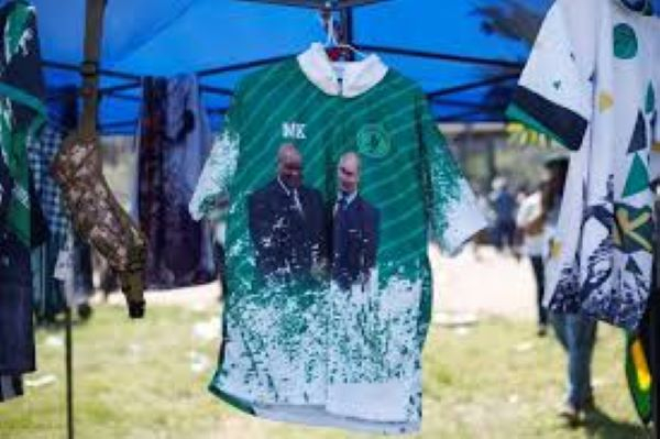 A stall sells T-shirts featuring Jacob Zuma and Vladimir Putin