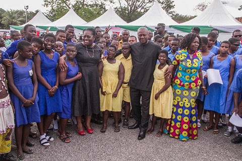 President John Dramani Mahama with Nana Oye Lithur and some students