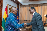 Former President Akufo-Addo [L] and Apostle Eric Nyamekye