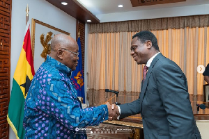 Former President Akufo-Addo [L] and Apostle Eric Nyamekye