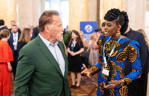 Former California Governor, Arnold Schwarzenegger(L) in a conversation with Victoria Michaels(R)