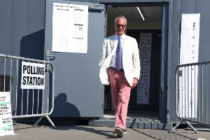 Britain's Reform UK party leader Nigel Farage leaves a polling station