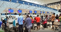 Photo: Passengers going through traveling formalities at the Kotoka Airport. Credit: Tell Ghana News