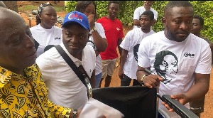 Chairman Odeneho Kwaku Appiah (in blue cap), popularly known as COKA, during the presentation