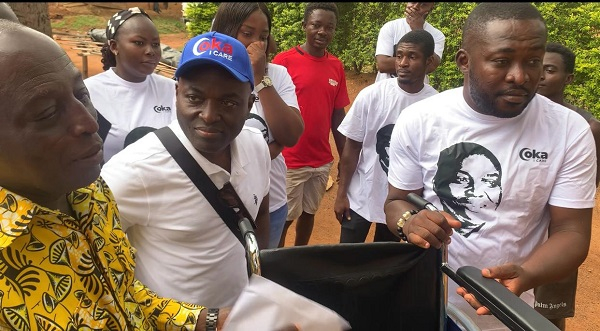 Chairman Odeneho Kwaku Appiah (in blue cap), popularly known as COKA, during the presentation