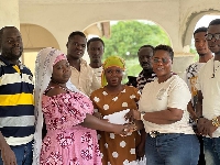 Member of Parliament for Jomoro Constituency, Dorcas Affo-Toffey and some of the beneficiaries