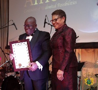 President Akufo-Addo being presented with a Congressional Record by US Congresswoman Karen Ruth Bass