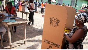 A voter casting her vote