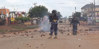 Police disperse violent youths who blocked sections of roads Buwenge Town on August 15, 2025