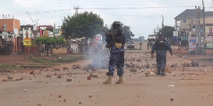 Police disperse violent youths who blocked sections of roads Buwenge Town on August 15, 2025
