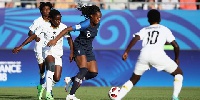France's Katoto sandwiched by Ghanaian players