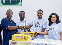 Charles Aidoo [2nd from right], others during the presentation