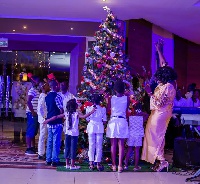 The event was climaxed by splendid performances by six children who lit the Christmas tree
