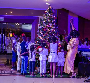 The event was climaxed by splendid performances by six children who lit the Christmas tree