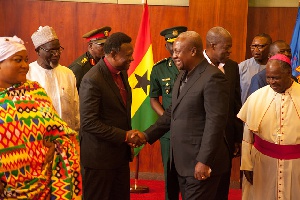 President Mahama in a handshake with Prof. Emmanuel Asante, Peace Council chairman