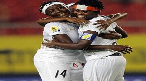 Adwoa Bayor with other female footballers