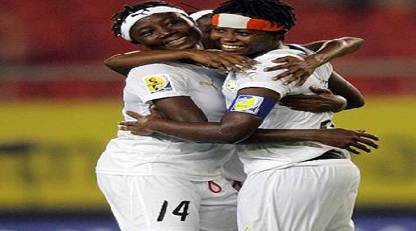 Adwoa Bayor with other female footballers