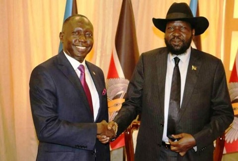 Ambassador Simon Michael Duku (left) and South Sudanese President Salva Kiir (right) in hand shake