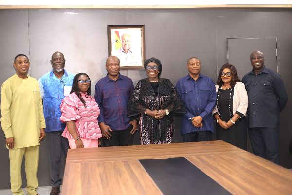 Dzifa Gomashie (M in black) with the team during the visit