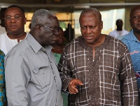 TUC boss Kofi Asamoah (left) in a conversation with President Mahama